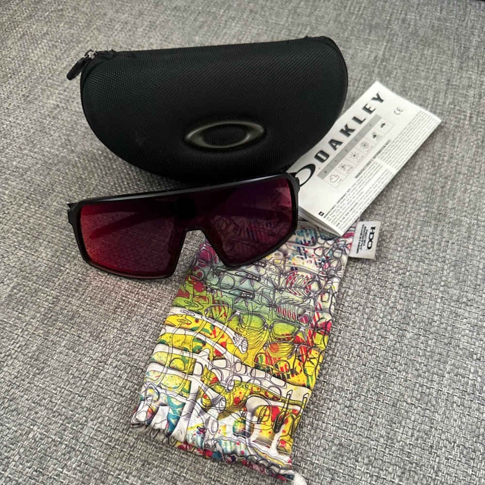 Oakley Sunglasses with Black Frame and Red Lenses